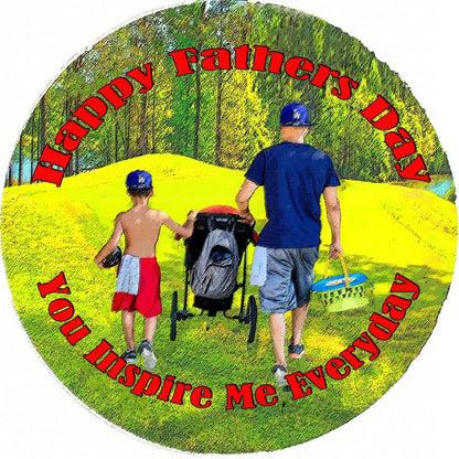 Father's Day edible icing cake topper with a father and children walking in a park, round design.