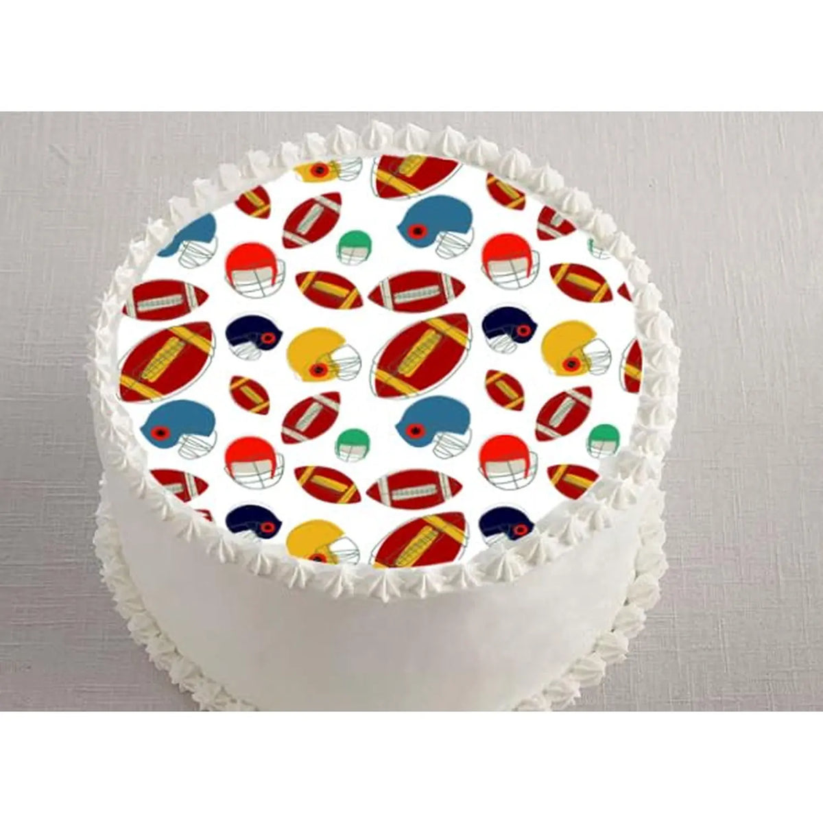 Football Game Edible Icing Cake Topper, on a white frosted cake.
