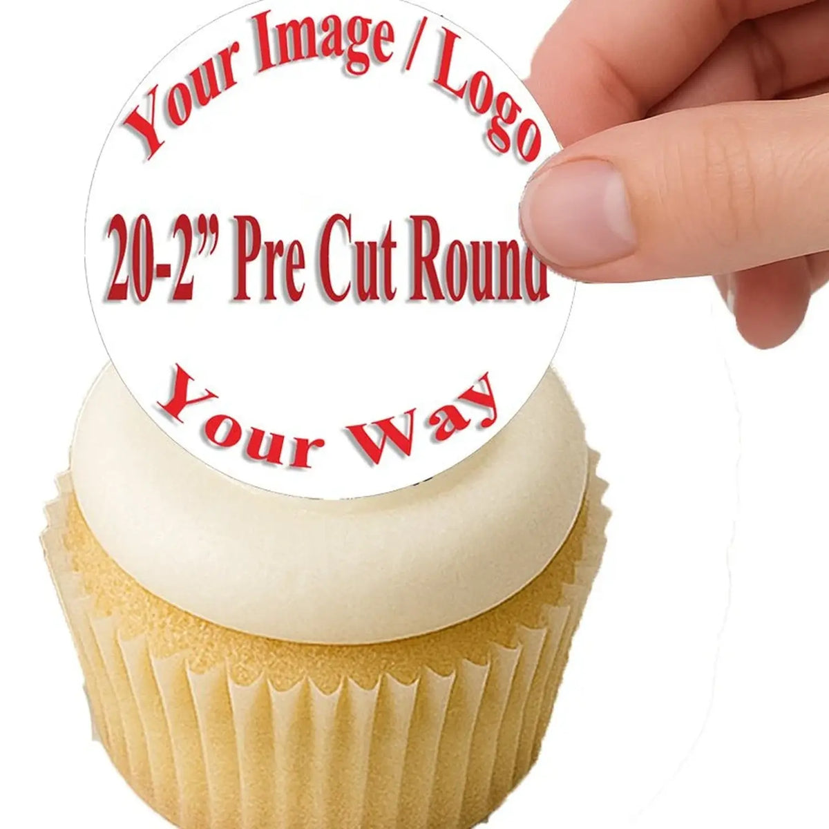 Easy to Apply: hand placing a precut 2-inch photo edible icing topper on a cupcake