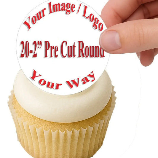 Easy to Apply: hand placing a precut 2-inch photo edible icing topper on a cupcake