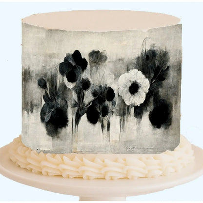 Monochrome Poem black and white floral seamless edible icing cake wrap displayed on a cake.
