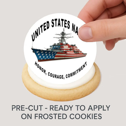 Navy Honor Courage Commitment Edible Cookie & Cupcake Toppers – 20 Precut being placed on a frosted cookie.