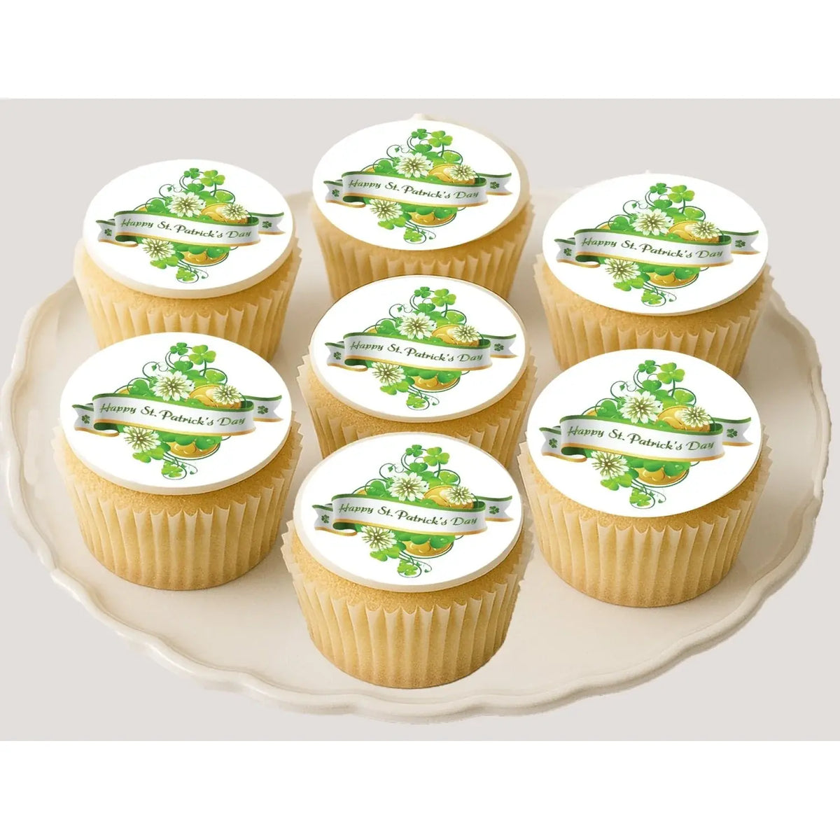 St. Patrick's Day edible icing cookie and cupcake toppers with St. Patrick's Day bouquet, on cupcakes.