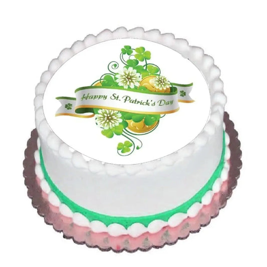 St. Patrick's Day edible icing cake topper with St. Patrick's Day floral bouquet, on a frosted cake.