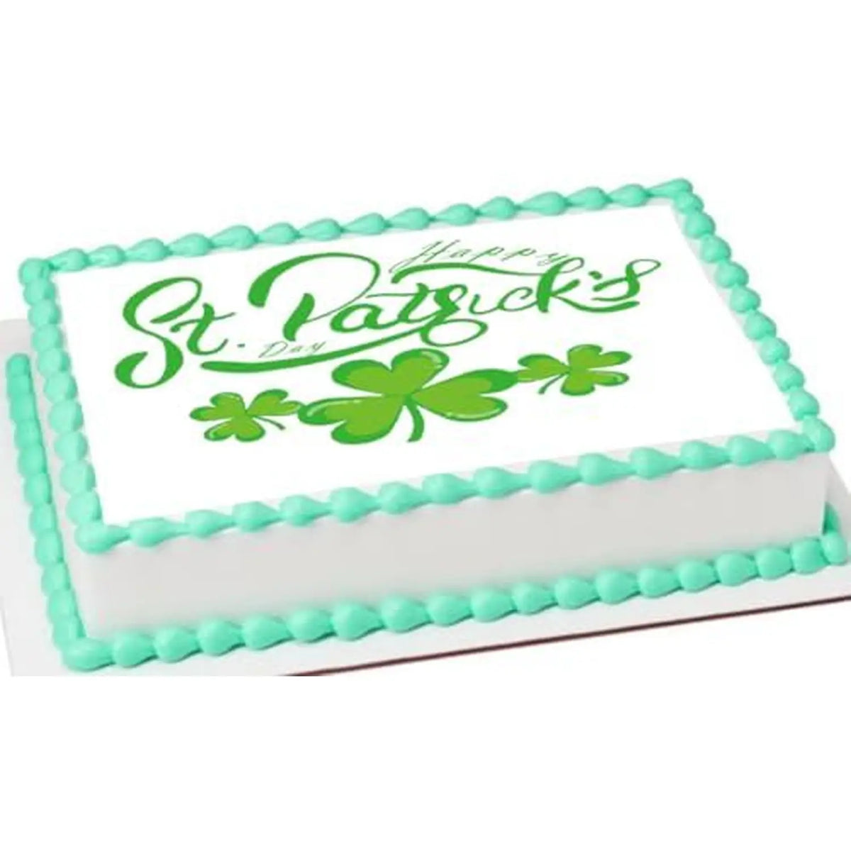 St. Patrick's Day edible icing cake topper with St. Patrick's Day shamrocks, on a sheet cake with green frosting.