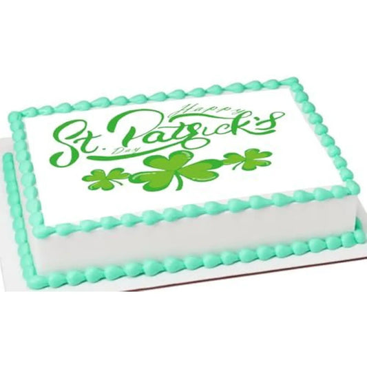 St. Patrick's Day edible icing cake topper with St. Patrick's Day shamrocks, on a sheet cake with green frosting.
