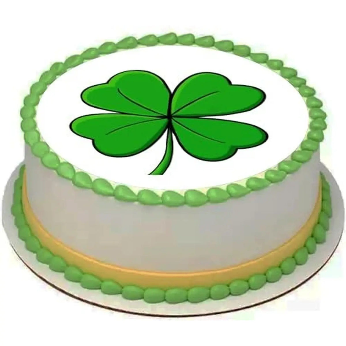 St. Patrick's Day edible icing cake topper with four-leaf clover, on a cake with green frosting.