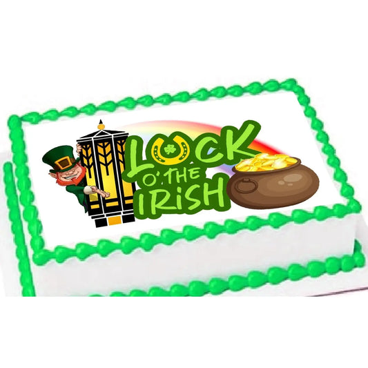 St. Patrick's Day edible icing cake topper with Luck of the Irish and pot of gold, on a sheet cake with green frosting.