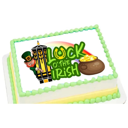 St. Patrick's Day edible icing cake topper with Luck of the Irish and pot of gold, on a sheet cake with yellow frosting.