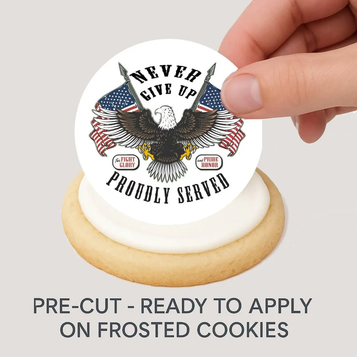 Veterans Proudly Served Eagle Flag Edible Cookie & Cupcake Toppers – 20 Precut being placed on a frosted cookie.